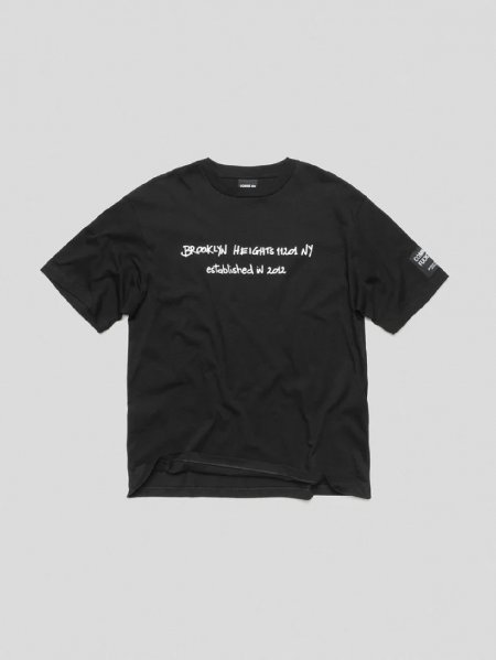 WHITE T-SHIRT WITH "NEVER STOP" PRINT UOMO VISION OF SUPER VS01115